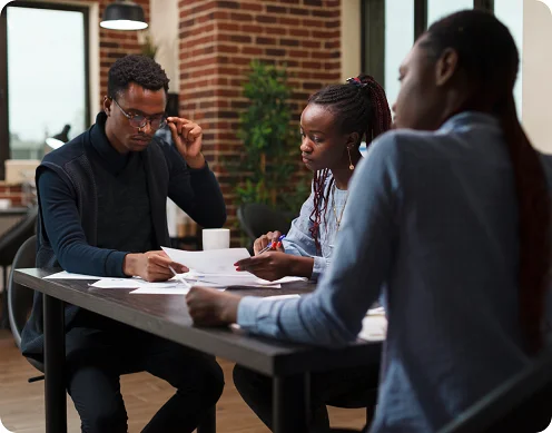 Team discussing agreement